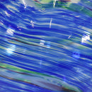 Blue swirl gazing globe with hints of green and red.