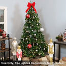 unlit artificial christmas tree with hinged branches