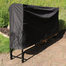 Black log rack cover covering a log rack on a stone patio.