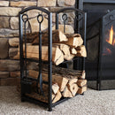 5-piece steel fireplace log holder with tools holds logs for a fire in front of an indoor fireplace.