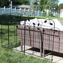 Black boarder fence pannels with leaf details boarding a patio furniture set on a outdoor patio.