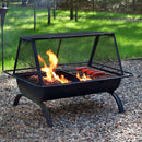 Hot dogs roasting on a rectangle outdoor cooking fire pit with a spark screen at a campground.
