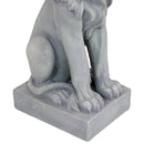 Feet, tail and square pedestal of stone lion outdoor statue.