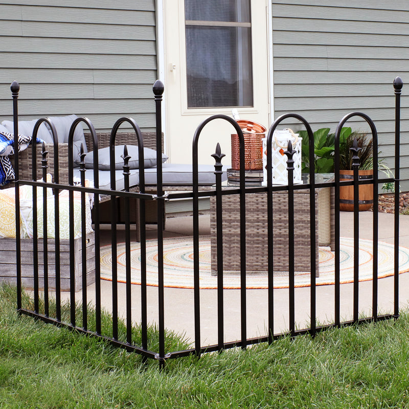 2-piece Strasbourg-style fence panels placed in grass connected to create a border around a backyard patio