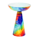 Glass Pedestal Bird Bath in rainbow featuring a wide, shallow glass bowl and tapered pedestal with a vibrant multicolor abstract pattern.