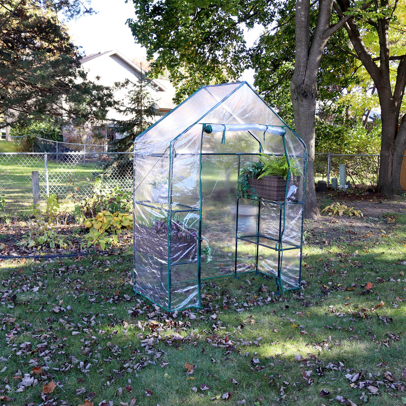 open zippered door for walk-in greenhouse with 4 shelves and clear cover