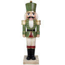 Green and red Christmas nutcracker statue with a traditional soldier design, white beard, gold shoulder accents, black boots, and a square wood-look base, shown against a white background.