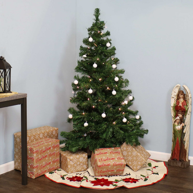 unlit faux christmas tree with metal stand