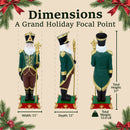 Three views of a tall decorative Santa figure showing its front, side, and back design, with measurements of 37 inches in height, 11 inches in width, 11 inches in depth, and a total weight of 13.6 pounds. Text reads “Dimensions” and “A Grand Holiday Focal Point.”