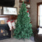 unlit faux christmas tree with metal stand