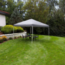 Gray 12'x12' pop up canopy with white frame set up in a backyard.