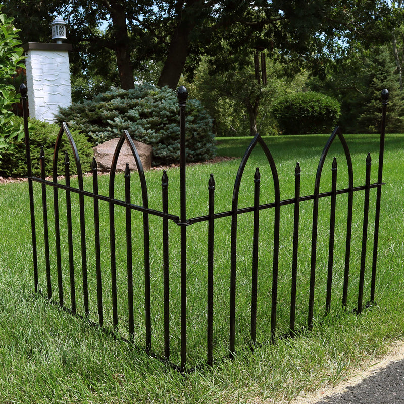 Metal garden border fence by the edge of the driveway
