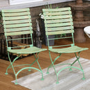 Hand-painted green folding, slatted chestnut bistro style dining side chairs on the patio.
