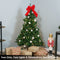 unlit artificial christmas tree with hinged branches