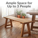 Sunnydaze Teak Trestle Bench in a farmhouse kitchen with text overlay saying ample space for up to 3 people