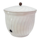 Decorative Metal Garden Hose Holder in ivory glaze, featuring a rounded ribbed design with a fitted lid, decorative top knob, and side opening for convenient hose access.