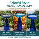 Blue glass birdbath shown in three uses: as a bird feeder, a decorative garden focal point, and a birdbath. Highlights durable, weather-resistant glass.