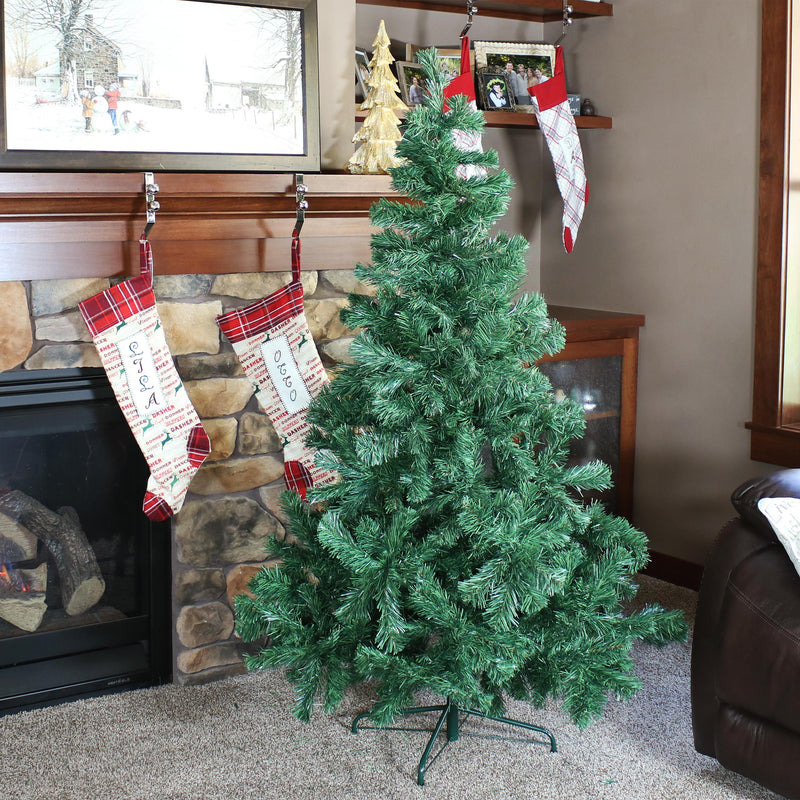 unlit faux christmas tree with metal stand