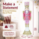 Product dimensions infographic featuring a pink, white, and gold Christmas nutcracker, showing a total height of 37.25 inches, width of 9.5 inches, depth of 10.5 inches, and weight of 11.2 pounds.
