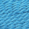 Sky blue colored woven rope of rope hammock chair. 