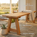 Sunnydaze Teak Trestle Bench in a covered patio during a bright warm morning, with text overlays of sturdy teak construction, 600 lb weight capacity, teak oil finish, and weather-resistant