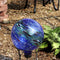 Dimension image for blue swirl gazing globe with hints of green and red.