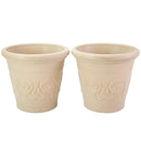 Two cream-colored decorative planters with raised floral scroll detailing, shown side by side against a white background.