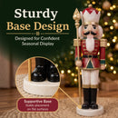 Red and green Christmas nutcracker king holding a gold scepter, featuring a sturdy round base with a close-up showing stable placement on flat surfaces.