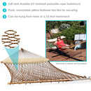 brown rope hammock with spreader bars and cream pillow