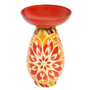 Mosaic Medallion Glass Bird Bath in orange featuring a wide red glass bowl and decorative pedestal with an intricate orange, red, cream, and green medallion pattern.