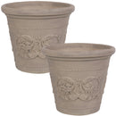 Large garden planter pots offering protection to its flowers on the deck.
