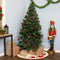 unlit faux christmas tree with metal stand