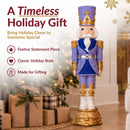 Timeless holiday gift infographic featuring a purple, blue, white, and gold Christmas nutcracker displayed beside a decorated Christmas tree and wrapped gifts, with callouts for festive statement piece, classic holiday style, and made for gifting.