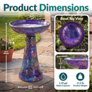 Product dimensions for the Crackled Glass Mosaic Bird Bath in iridescent purple, measuring 18.5 inches tall with a 12-inch bowl diameter, 2.75-inch bowl depth, and 8.25-inch base. Holds 1.35 gallons of water and weighs 11.2 pounds.