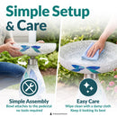 Mosaic Bloom Glass Bird Bath in indigo shown being assembled and cleaned outdoors. The bowl attaches to the pedestal without tools, and the glass surface can be wiped clean with a damp cloth.