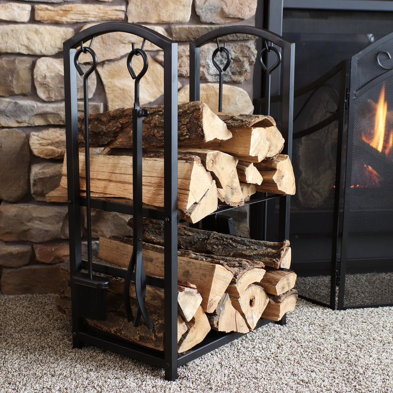 5-piece steel fireplace log holder with tools holds logs for a fire in front of an indoor fireplace.
