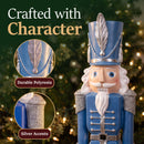 Blue Kristoff Christmas Nutcracker shown in a festive holiday setting, highlighting durable polyresin construction and decorative silver accents on the hat and shoulders.