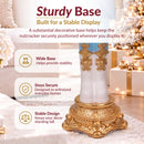 Sturdy base infographic featuring the ornate gold base and white boots of a blue, white, and gold Christmas nutcracker, with callouts highlighting a wide base, secure design, and stability.