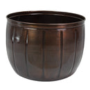 Rear view of the bronze Embossed Panel Hose Pot, featuring a rounded metal design with vertical embossed panel detailing and a rolled upper rim.