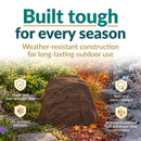 Infographic featuring a tall, tapered dark brown faux rock cover in a landscaped garden transitioning through different seasons. Text highlights weather-resistant construction, including a crack- and fade-resistant shell, UV-resistant polyresin, rain and snow resistance, and durability in extreme heat and freeze-thaw conditions.