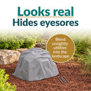 Infographic featuring a gray faux rock cover with a realistic stone texture in a mulched garden bed. Text reads “Looks real, Hides eyesores” with a callout highlighting its ability to blend unsightly utilities into the landscape. Three metal ground stakes are shown beside the rock.