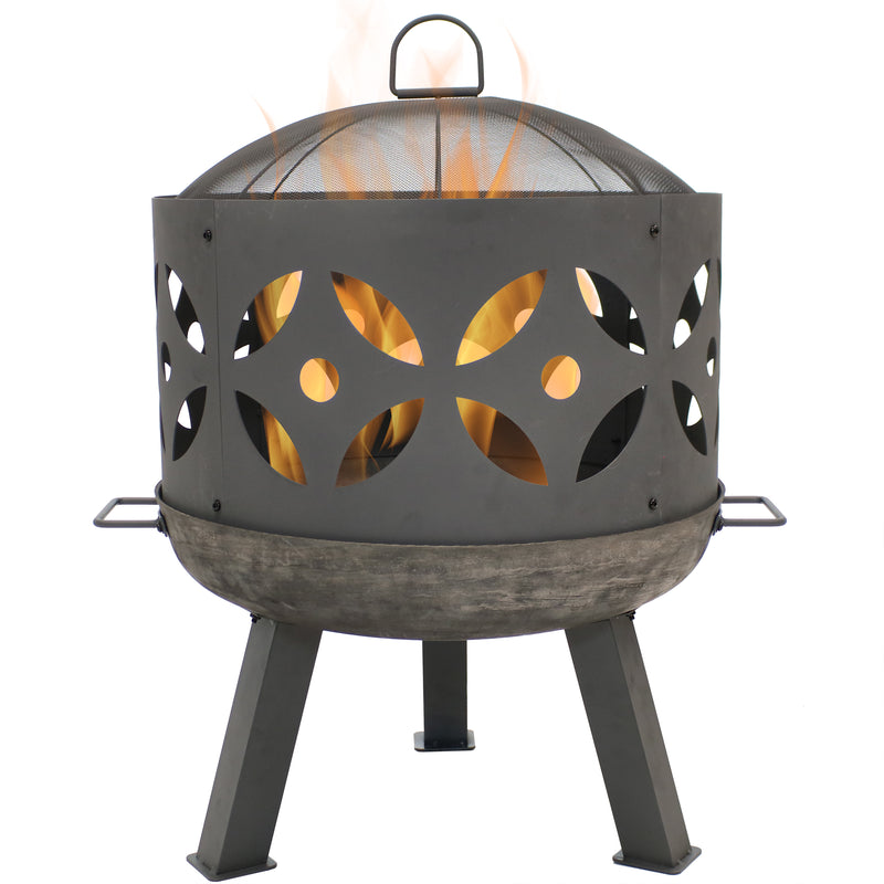 Outdoor retro cast iron fire pit with handles and spark screen shown with fire burning