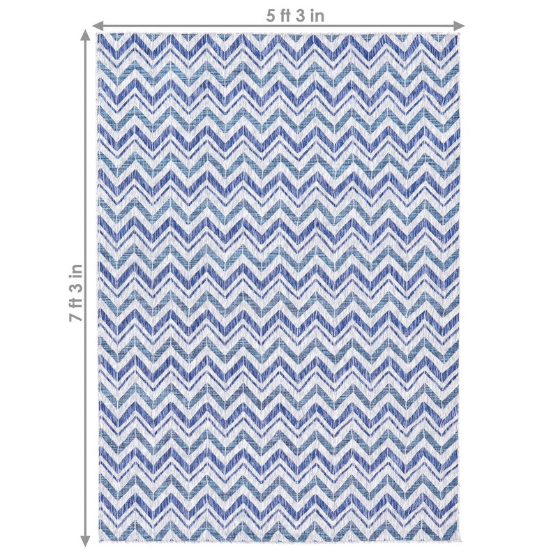 corner of chevron blue/gray indoor/outdoor rug
