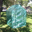 closed door for walk-in greenhouse with 4 shelves and green cover