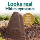 Dark brown faux rock utility cover with a realistic stone texture displayed in a landscaped garden. Text highlights its natural appearance and ability to conceal unsightly utilities. Four metal ground stakes are shown beside the rock.