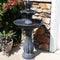 Black spiral, blubber fountain topper with water streams following into the small, top tier.