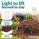 Infographic showing a lightweight, flat dark brown faux rock cover being lifted over a sprinkler valve in a landscaped garden. Text highlights its 4.2 lb weight, three included 12-inch metal stakes, and built-in stake holes for secure outdoor placement.