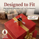Present Pile Decorative Christmas Tree Base shown from above, featuring a built-in holder with three securing bolts designed to fit artificial tree poles up to 1.5 inches in diameter.