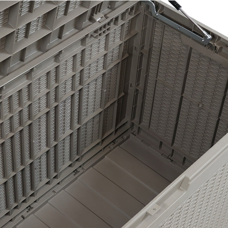 Aerial view of the inside tan rattan deck storage box.