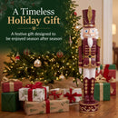 Kristoff Christmas Nutcracker shown beside a decorated Christmas tree and wrapped gifts, highlighting a festive holiday gift designed to be enjoyed season after season.